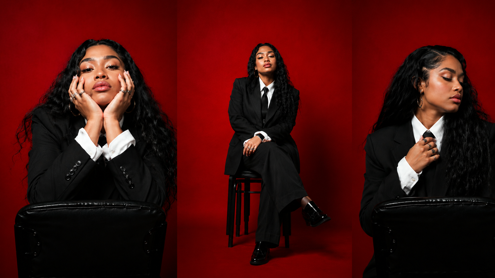 Amara Reign — artist portrait, seated on a red couch against a crimson backdrop